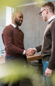 side-view-two-men-handshaking-agreement-after-meeting_23-2148817031