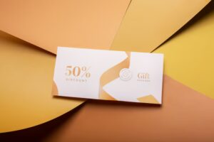 beautiful-gift-voucher-with-hand_23-2149243858